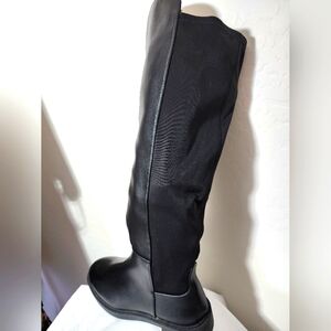 Women's Black Knee-High Boots.